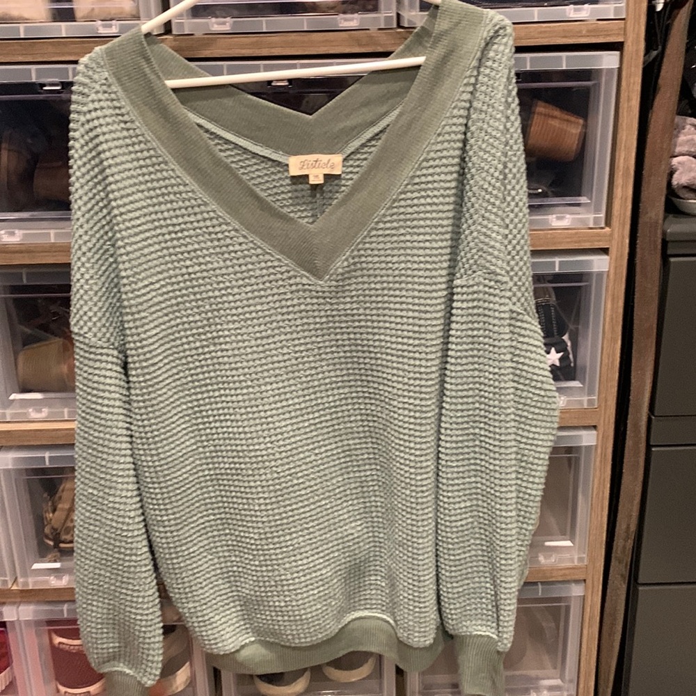 Listicle top. Deep v-neck. Waffle knit. Great light green color